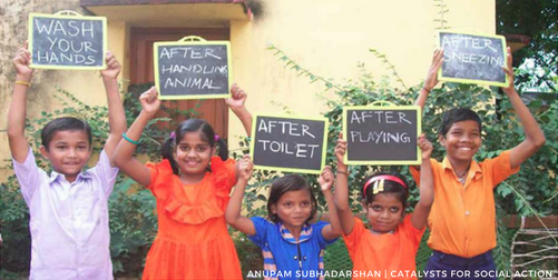 five children holding signs says when you should wash your hands