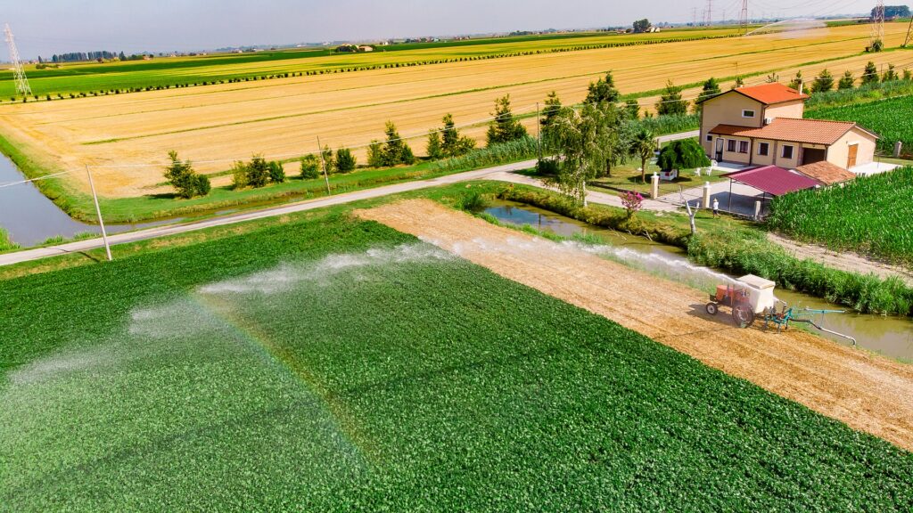 Farm field with irrigation from canal